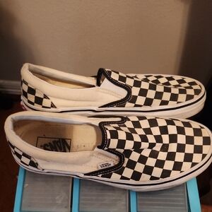 Vans Black and White Checkerboard Slip-Ons